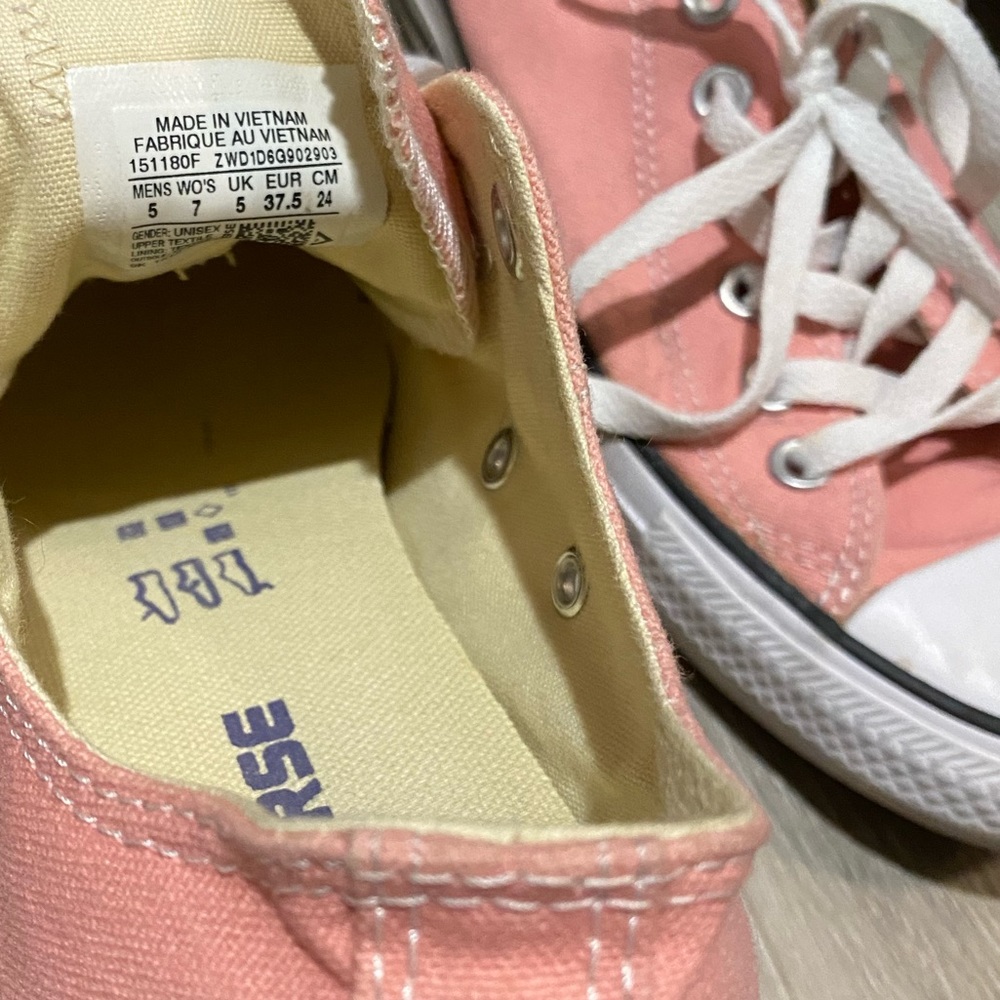 Pink Chuck Taylor shoes